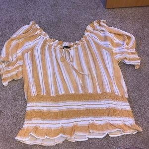 White and yellow shirt